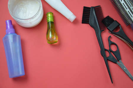 hairdresser Accessories for coloring hair on a pink backgroundの写真素材