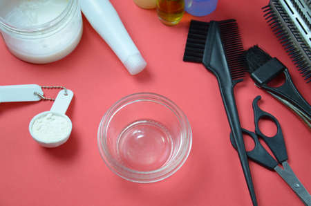 hairdresser Accessories for coloring hair on a pink backgroundの写真素材