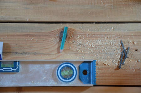 Hexagon screws on a wooden floor. tool to repair service, build, woodworking instrumentの写真素材