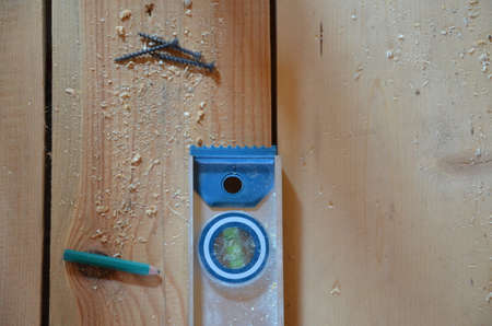 Hexagon screws on a wooden floor. tool to repair service, build, woodworking instrumentの写真素材