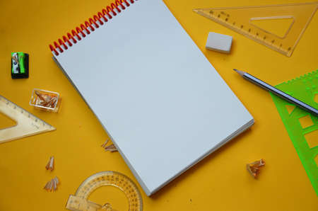 Back to school set in yellow. , notebook, pen, pencils, scissors, markers, chair, clip, glasses,...