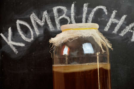 fermented drink, jun tea healthy natural probiotic in a glass jar.の写真素材