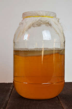 fermented drink, jun tea healthy natural probiotic in a glass jar.の写真素材