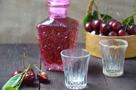 Cherry Drink Mulled Wine, horizontal, selective focus. cherry alcohol tincture. liquor.の写真素材