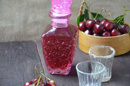 Cherry Drink Mulled Wine, horizontal, selective focus. cherry alcohol tincture. liquor.の写真素材