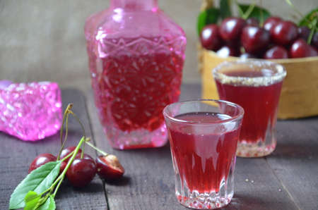 Cherry Drink Mulled Wine, horizontal, selective focus. cherry alcohol tincture. liquor.の写真素材