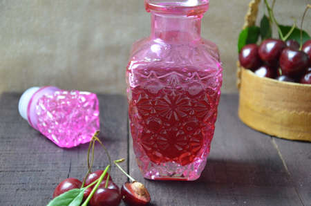 Cherry Drink Mulled Wine, horizontal, selective focus. cherry alcohol tincture. liquor.の写真素材