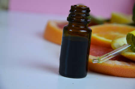 Citrus fruit vitamin c serum oil beauty care, anti aging natural cosmetic. essence, aromatherapy. copy space. top viewの写真素材