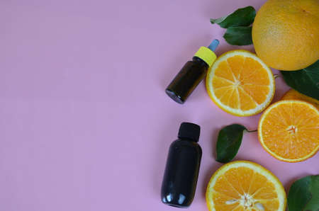 Citrus fruit vitamin c serum oil beauty care, anti aging natural cosmetic. essence, aromatherapy. copy space. top viewの写真素材