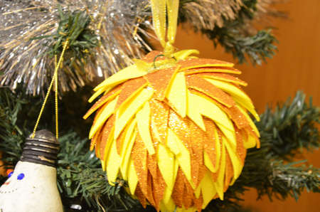 Decorated Christmas tree on blurred, sparkling and fairy backgroundの写真素材