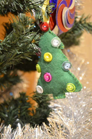 Decorated Christmas tree on blurred, sparkling and fairy backgroundの写真素材