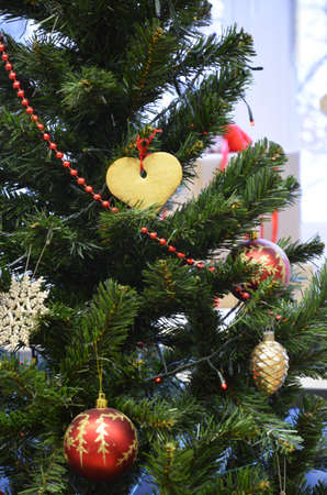 Decorated Christmas tree on blurred, sparkling and fairy backgroundの写真素材