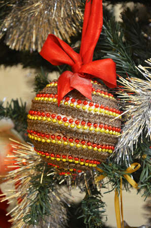 Decorated Christmas tree on blurred, sparkling and fairy backgroundの写真素材