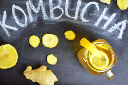 Homemade fermented raw kombucha tea with different flavorings. Healthy natural probiotic flavored...