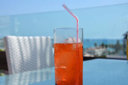 Refreshing cocktail on beach table.の写真素材
