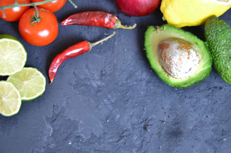 Set of traditional mexican dishes - burrito bowl, nachos, guacamole and salsa dressing, chili...