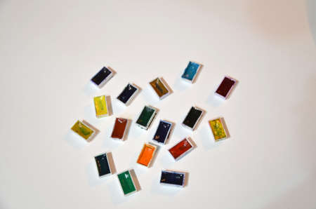 Paints and brushes on the white background.の写真素材