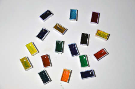 Paints and brushes on the white background.の写真素材