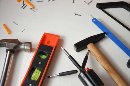 professional builder work with house renovation instruments on white background top viewの写真素材