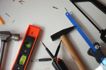 professional builder work with house renovation instruments on white background top viewの写真素材