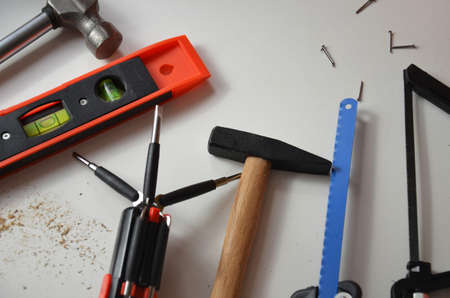 professional builder work with house renovation instruments on white background top viewの写真素材