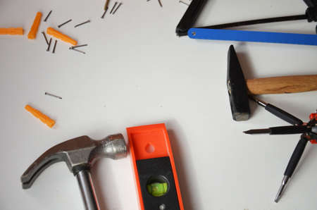 professional builder work with house renovation instruments on white background top viewの写真素材