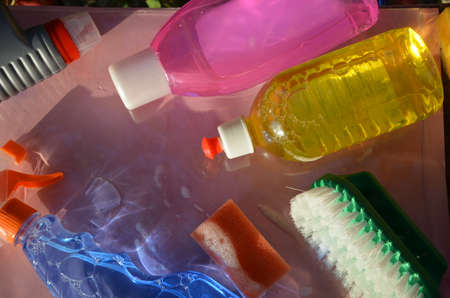 Household items,domestic cleaning sanitary supplies. window cleaner, cloth, brush, spring cleaning.の写真素材