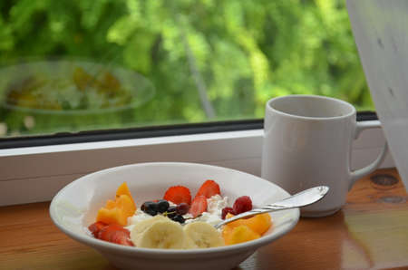Healthy breakfast or snack curd with fruit and nuts. The concept of nutrition for weight loss. Keto...