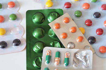 Different medicines: tablets, pills in blister pack, medications drugs, macro, selective focus, copy...