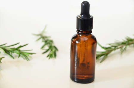 Herbal essential oil on vintage apothecary bottles. Alternative medicine, skin care, aromatherapy and natural medicine.の写真素材