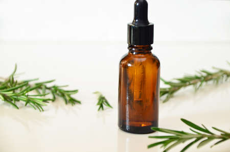 Herbal essential oil on vintage apothecary bottles. Alternative medicine, skin care, aromatherapy and natural medicine.の写真素材