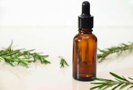 Herbal essential oil on vintage apothecary bottles. Alternative medicine, skin care, aromatherapy and natural medicine.の写真素材