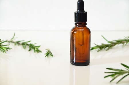 Herbal essential oil on vintage apothecary bottles. Alternative medicine, skin care, aromatherapy and natural medicine.の写真素材