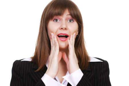 Portrait of a very surprised beautiful businesswoman isolated on a white backgroundの写真素材