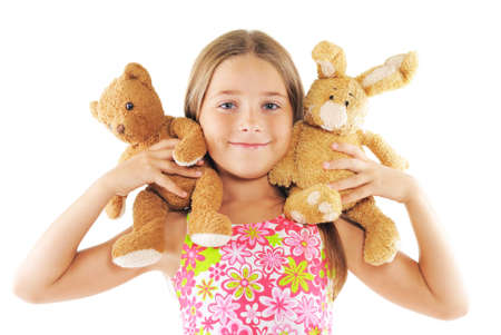 Little girl playing with toys. On white backgroundの写真素材