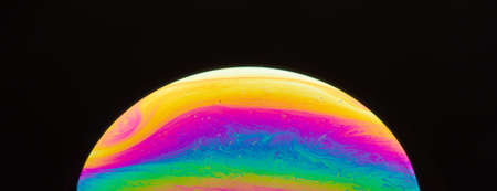 Vibrant color spectrum on the soap bubble surfaceの写真素材