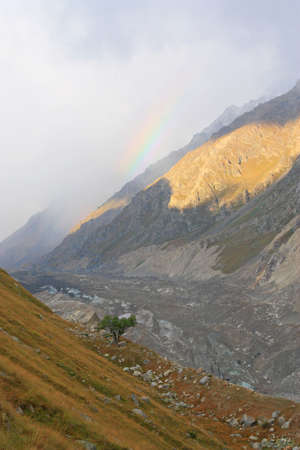 High-mountainous gorge. At the bottom of gorge there is a glacier of Bezengi (the biggest glacier in Europe)の写真素材