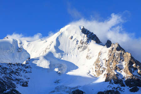 mountain peak shined by the morning sun