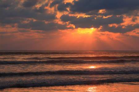 sunset over the tropical part of the Pacific Oceanの写真素材