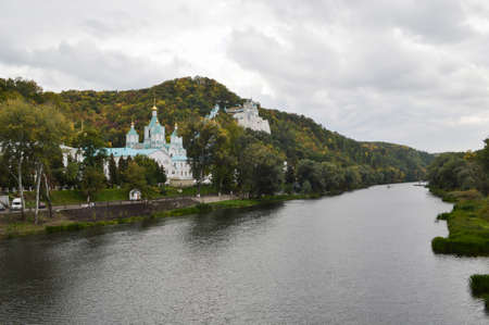 Svyatogorsk, Svyatogorsk Lavra of the Holy Dormition, Ukraine-June 2020, a monastery in the chalk mountains on the banks of the Seversky Donets river in cloudy weatherのeditorial素材