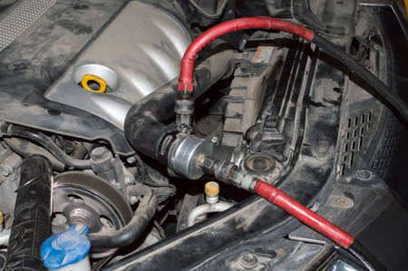 The hoses are connected to the cooling system of the automobile internal combustion engineの写真素材