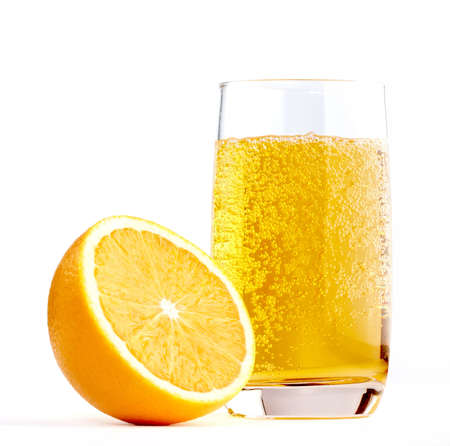 Half of A Orange with Glass of Lemonade isolated on a whiteの写真素材