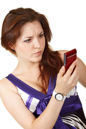 Young beautiful woman reading smsの写真素材