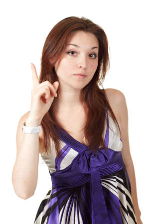 Gorgeous young woman gesturing a warning, white backgroundの写真素材