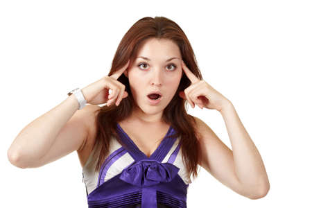 young woman pointing her fingers to the headの写真素材