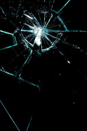 broken glass on a black backgroundの写真素材