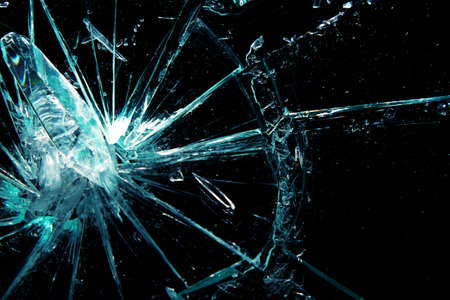 broken glass on a black backgroundの写真素材
