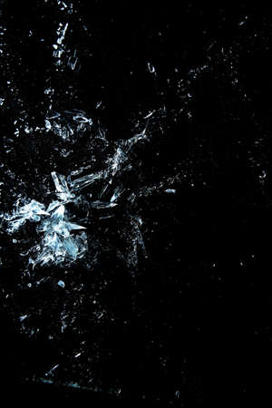 broken glass on a black backgroundの写真素材