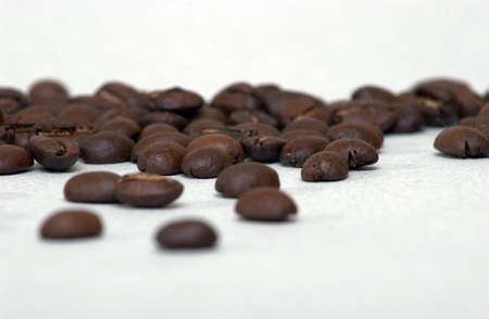 Coffee beans isolated over white backgroundの写真素材