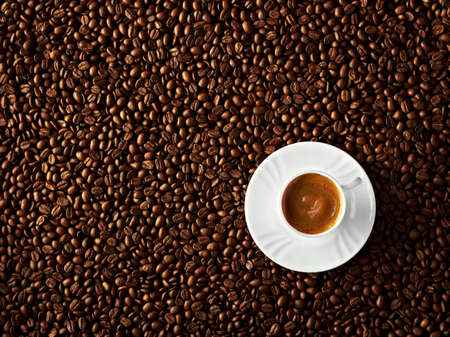 A cup of cappuccino on coffee beans background